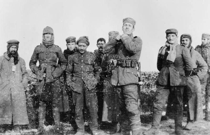 German soldiers of the 134th Saxon Regiment photographed with men of the 2nd Battalion Royal Dublin Fusiliers in No Man's Land on the Western Front.